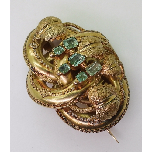 2809 - A VICTORIAN BROOCH the knot form with applied wire work details, is made in yellow metal and se... 