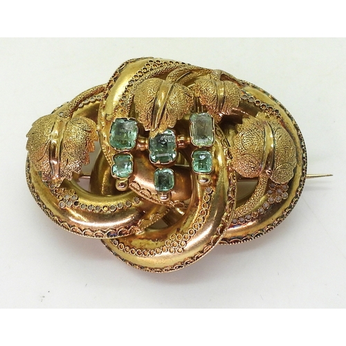 2809 - A VICTORIAN BROOCH the knot form with applied wire work details, is made in yellow metal and se... 