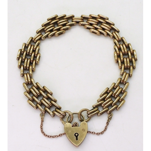 2815 - A 9CT GATE BRACELETwith decorative links and a heart shaped clasp, length 18.5cm, weight 15.8gms... 