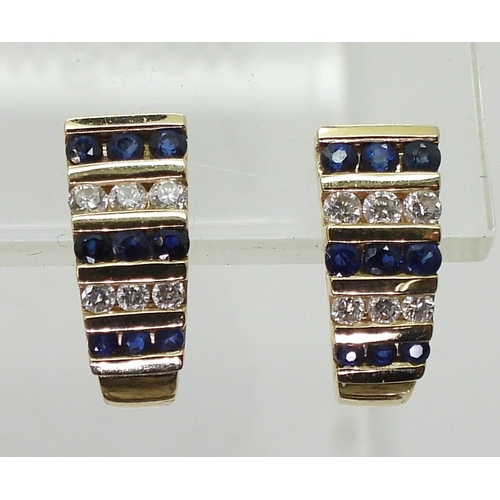 2816 - SAPPHIRE & DIAMOND EARRINGSset with alternate rows of sapphires and brilliant cut diamonds with ... 