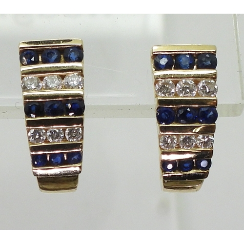 2816 - SAPPHIRE & DIAMOND EARRINGSset with alternate rows of sapphires and brilliant cut diamonds with ... 