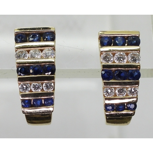 2816 - SAPPHIRE & DIAMOND EARRINGSset with alternate rows of sapphires and brilliant cut diamonds with ... 