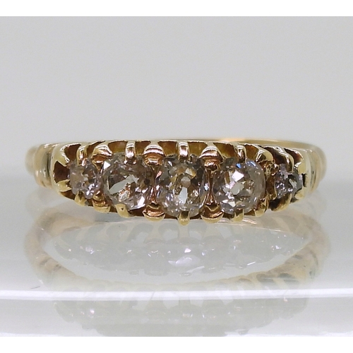 2825 - A FIVE STONE DIAMOND RINGset with estimated approximately 0.55cts of old cut diamonds in a yellow me... 