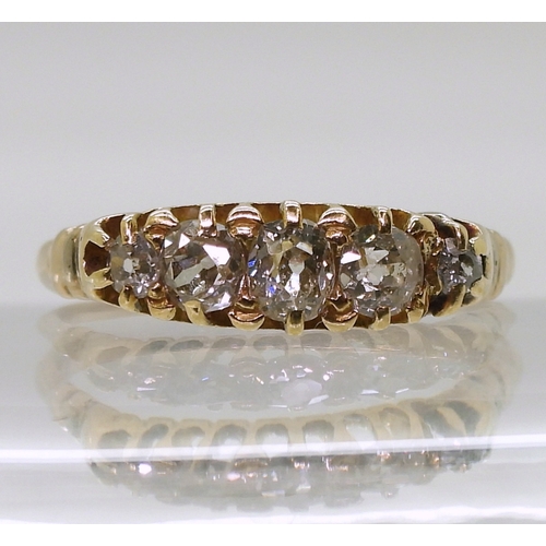 2825 - A FIVE STONE DIAMOND RINGset with estimated approximately 0.55cts of old cut diamonds in a yellow me... 