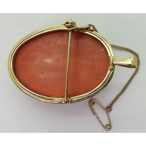 2826 - A CORAL CAMEO BROOCHthe well carved high relief cameo of a maiden is in a 18ct gold pendant brooch m... 