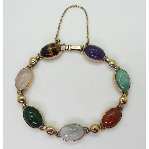 2830 - A MIXED GEMSTONE BRACELETin the Scottish style, set with a selection of semi precious gems to includ... 