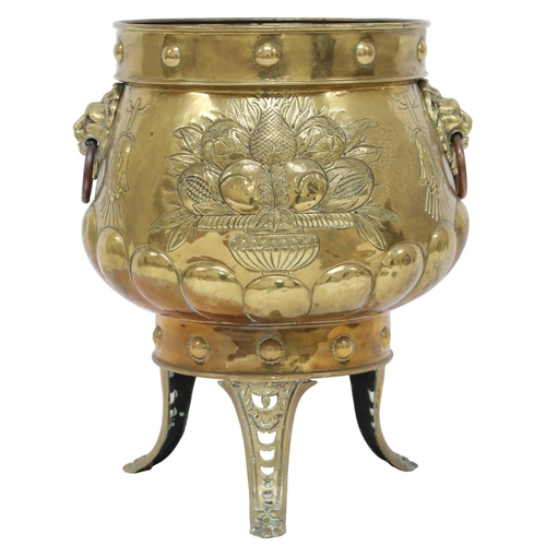 2013 - A DUTCH BRASS PLANTER with bulbous body embossed with armorial crest to one side and fruit/foliate m... 