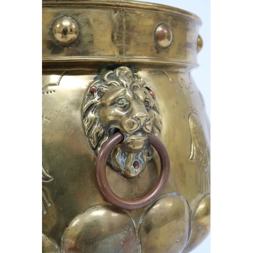 2013 - A DUTCH BRASS PLANTER with bulbous body embossed with armorial crest to one side and fruit/foliate m... 