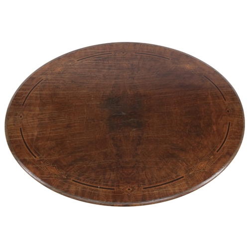 2016 - A VICTORIAN WALNUT OVAL  CENTRE TABLE oval top with quarter match veneer with boxwood and ebony inla... 