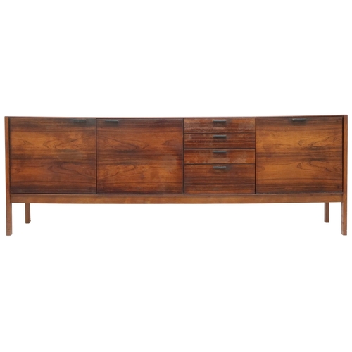 2077 - A MID 20TH CENTURY MACASSAR MEREDEW SIDEBOARD with four graduating drawers flanked by pair of cabine... 