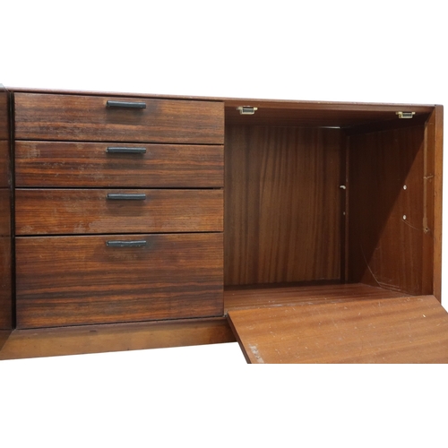 2077 - A MID 20TH CENTURY MACASSAR MEREDEW SIDEBOARD with four graduating drawers flanked by pair of cabine... 