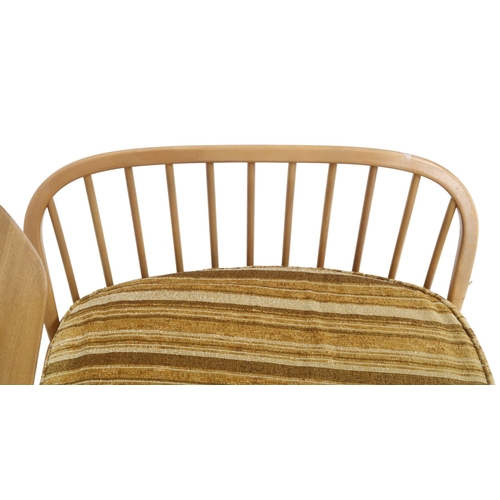 2078 - A MID 20TH CENTURY ERCOL BLONDE ELM AND BEECH DAY BED with removable back rest over upholstered cush... 