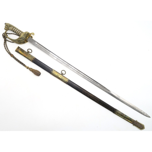 2610 - AN ATTRIBUTED 1846 PATTERN ROYAL NAVAL OFFICER'S SWORDThe folding inner guard engraved 