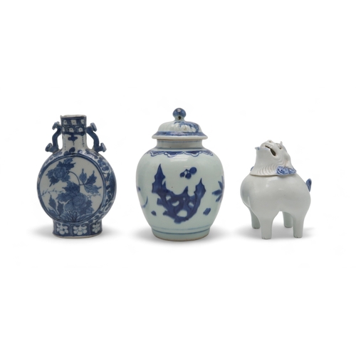 2401 - A CHINESE BLUE AND WHITE JAR AND COVERpainted with fruit, foliage and rockwork, 16.5cm high, blue an... 