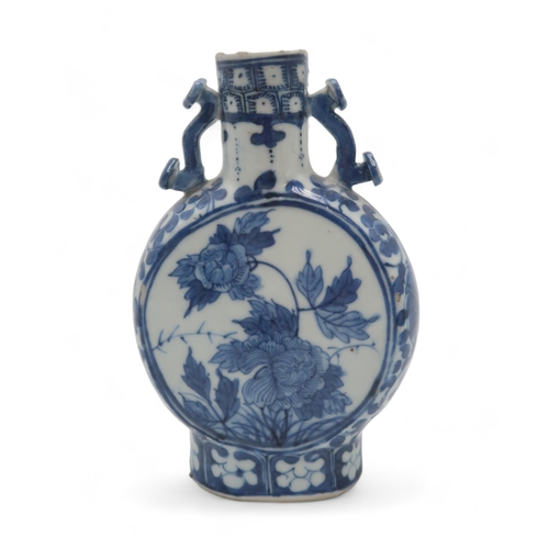 2401 - A CHINESE BLUE AND WHITE JAR AND COVERpainted with fruit, foliage and rockwork, 16.5cm high, blue an... 