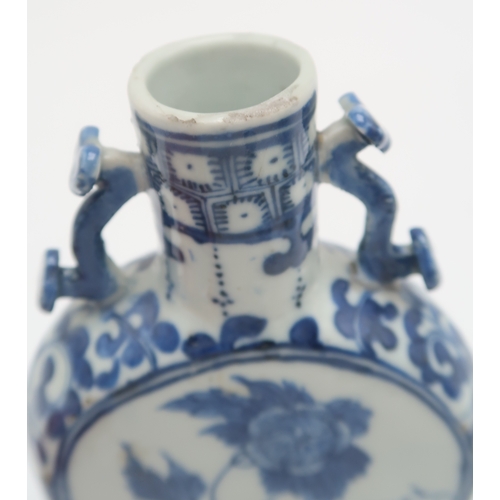 2401 - A CHINESE BLUE AND WHITE JAR AND COVERpainted with fruit, foliage and rockwork, 16.5cm high, blue an... 