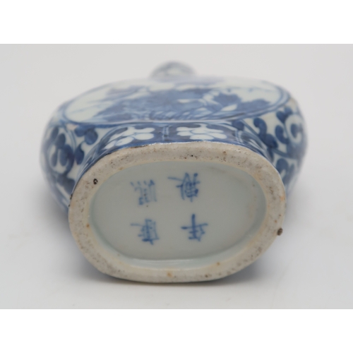 2401 - A CHINESE BLUE AND WHITE JAR AND COVERpainted with fruit, foliage and rockwork, 16.5cm high, blue an... 