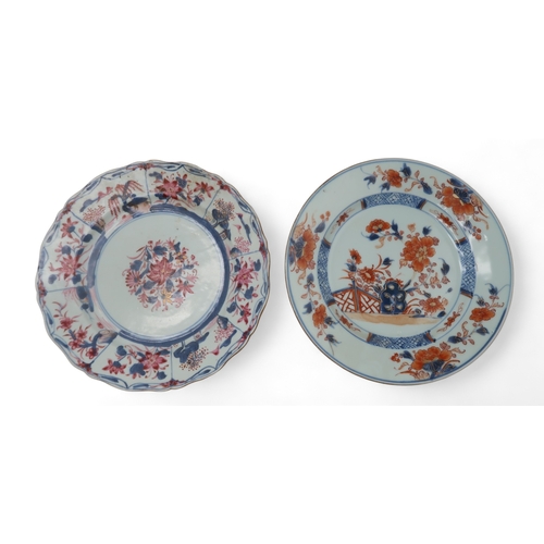 2402 - EIGHT VARIOUS CHINESE EXPORT IMARI PATTERN PLATESpainted with flowers, 22.5cm and 23cm diameter and ... 