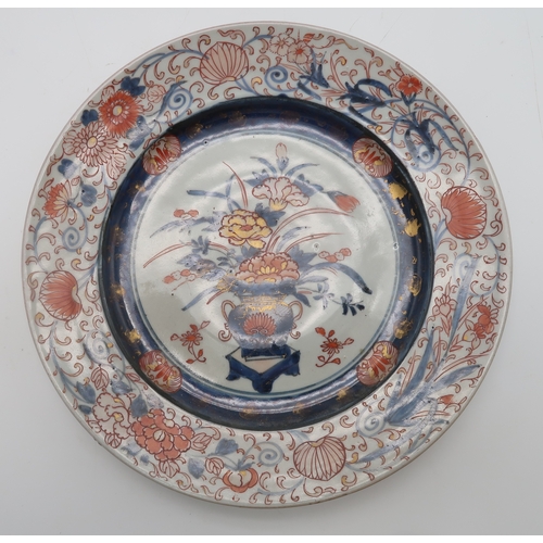 2402 - EIGHT VARIOUS CHINESE EXPORT IMARI PATTERN PLATESpainted with flowers, 22.5cm and 23cm diameter and ... 