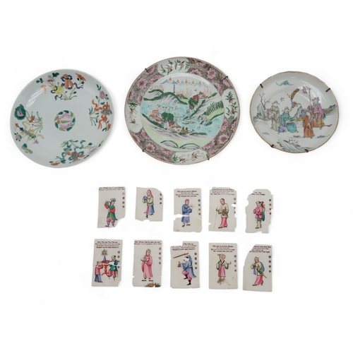 2410 - A CHINESE DISH AND TWO PLATESthe dish painted with officials, 18.5cm diameter, a plate with mountain... 