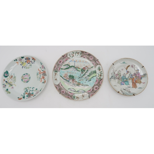 2410 - A CHINESE DISH AND TWO PLATESthe dish painted with officials, 18.5cm diameter, a plate with mountain... 