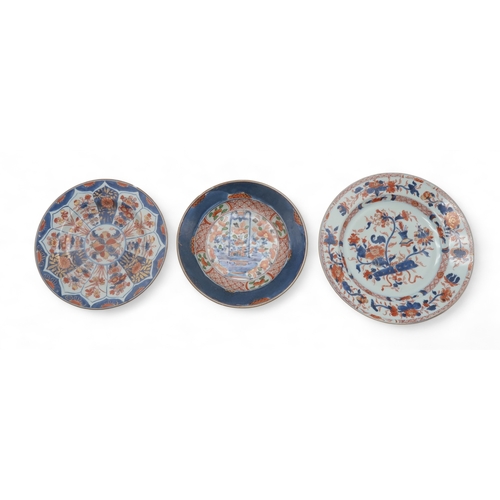 2411 - THREE CHINESE IMARI PLATES painted with precious objects, basket of flowers and floral lappets, 25, ... 