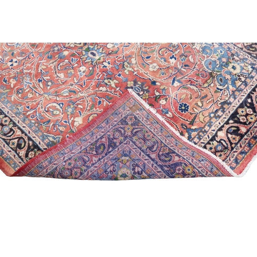 2123 - A TERRACOTTA GROUND FULL PILE PERSIAN SUROK RUNNER with dark central medallion and light blue s... 