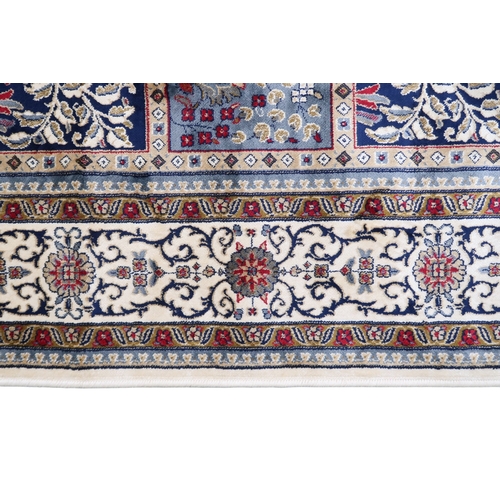 2129 - AN IVORY GROUND FULL PILE PERSIAN STYLE RUG  with multicoloured panel design within cream flora... 