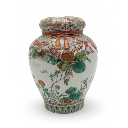 2419 - A JAPANESE KUTANI TROMPE-LOEIL JAR AND COVERwith simulated decoration of fabric covering the lid and... 