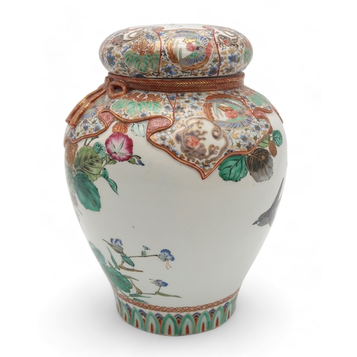 2419 - A JAPANESE KUTANI TROMPE-LOEIL JAR AND COVERwith simulated decoration of fabric covering the lid and... 