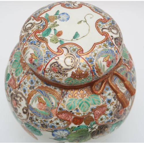 2419 - A JAPANESE KUTANI TROMPE-LOEIL JAR AND COVERwith simulated decoration of fabric covering the lid and... 