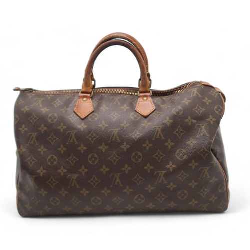 2672 - LOUIS VUITTON: A MONOGRAM SPEEDY 40monogram canvas with leather trim and gold hardware, 40cm wide, 2... 