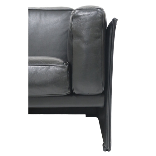 2085 - A 20TH CENTURY CASSINA TWO SEATER SETTEEwith black leather upholstered cushions on leather upholster... 