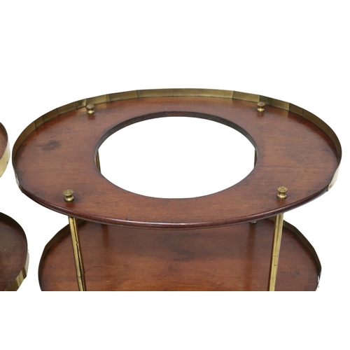 2028 - A SIMILAR PAIR OF EARLY 19TH CENTURY MAHOGANY CAMPAIGN WASHSTANDS top with circular cut-out and bras... 