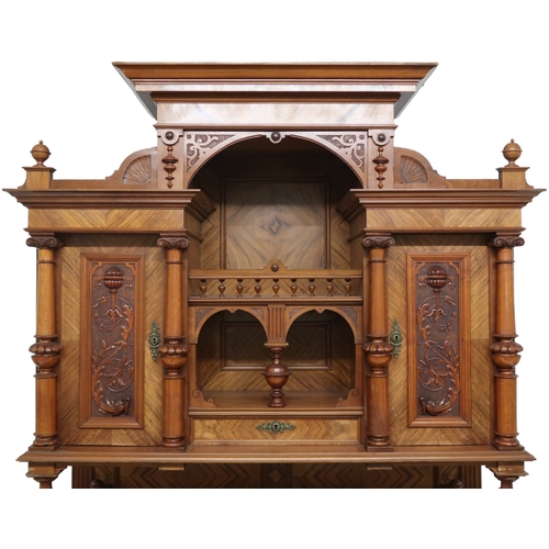 2033 - A 19TH CENTURY CONTINENTAL MAHOGANY AND WALNUT VENEERED SIDEBOARD stepped superstructure with m... 