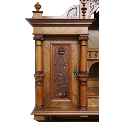 2033 - A 19TH CENTURY CONTINENTAL MAHOGANY AND WALNUT VENEERED SIDEBOARD stepped superstructure with m... 