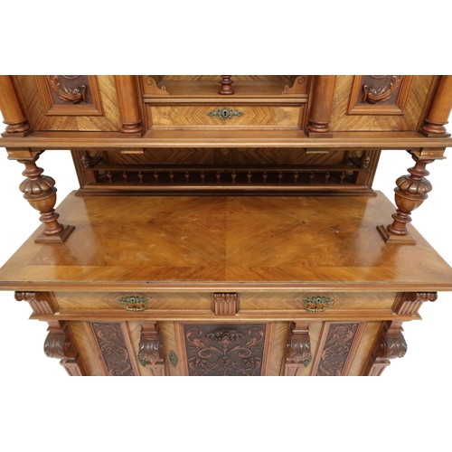 2033 - A 19TH CENTURY CONTINENTAL MAHOGANY AND WALNUT VENEERED SIDEBOARD stepped superstructure with m... 