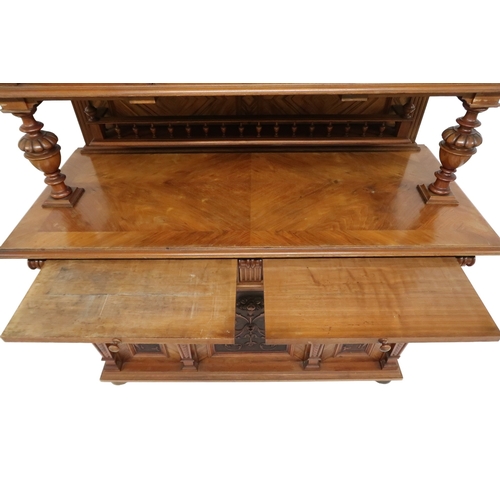 2033 - A 19TH CENTURY CONTINENTAL MAHOGANY AND WALNUT VENEERED SIDEBOARD stepped superstructure with m... 