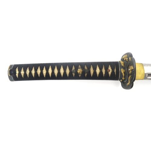 2609 - A FINE JAPANESE KATANAWith ornately cast bronze mounts throughout featuring gilt dragons; the white ... 