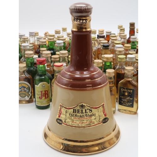 2698 - SCOTCH WHISKY A Collection Of Scotch Whisky Miniatures Together With A Bells Whisky Decanter And Liq... 