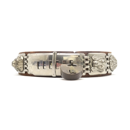 2667 - AN IMPRESSIVE WHITE METAL-MOUNTED LEATHER DOG COLLARCirca-1900, the linked metal plates each bearing... 