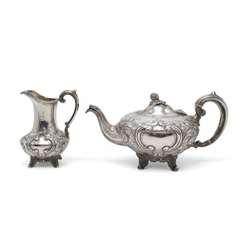 2541 - A MATCHED VICTORIAN SILVER PART TEA SERVICEby H J Lias & Son, the teapot 1875, the cream jug 187... 