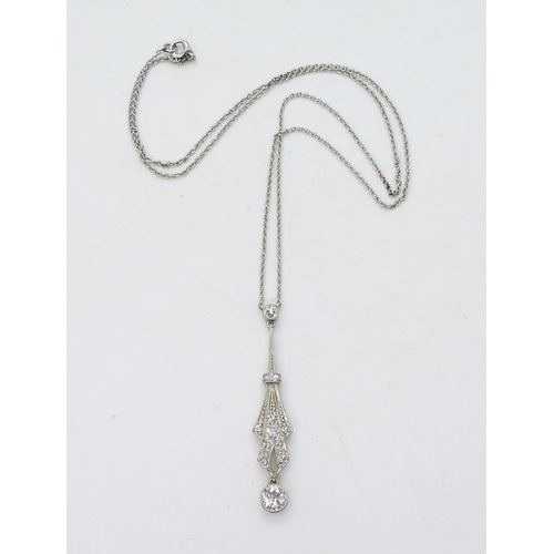 2811 - AN ART DECO PENDANT NECKLETmounted in platinum, stamped Pt. The largest diamond is estimated to be 0... 