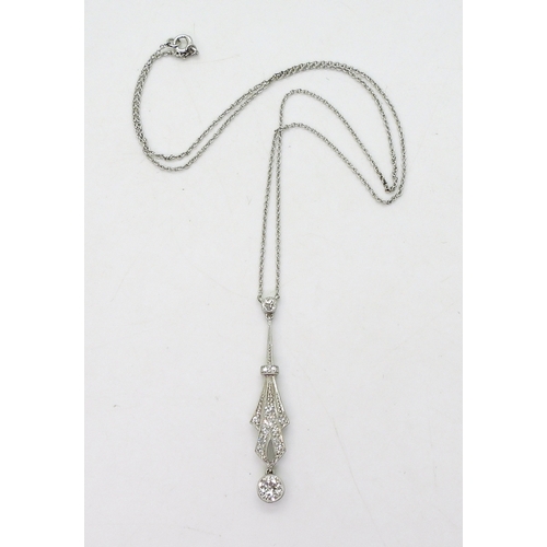 2811 - AN ART DECO PENDANT NECKLETmounted in platinum, stamped Pt. The largest diamond is estimated to be 0... 