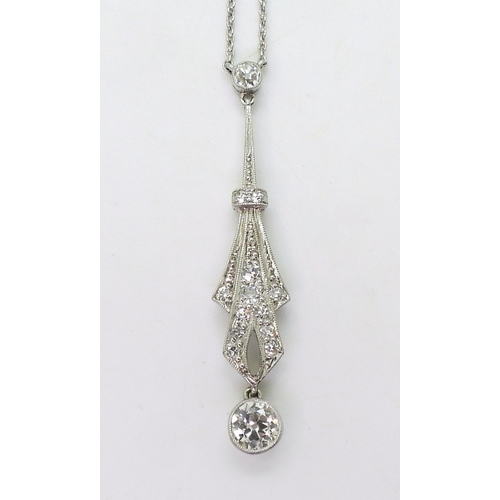 2811 - AN ART DECO PENDANT NECKLETmounted in platinum, stamped Pt. The largest diamond is estimated to be 0... 