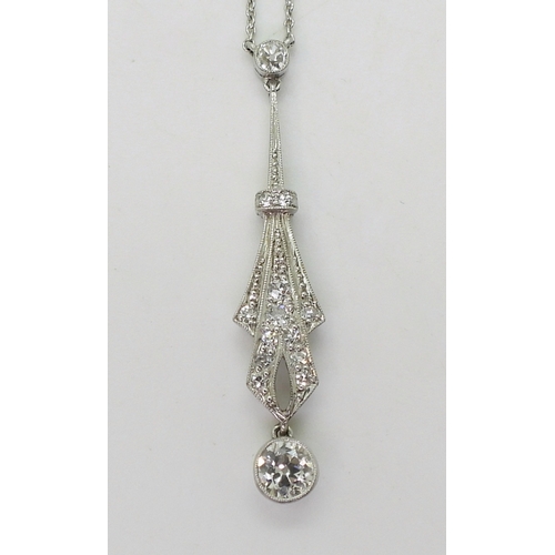 2811 - AN ART DECO PENDANT NECKLETmounted in platinum, stamped Pt. The largest diamond is estimated to be 0... 