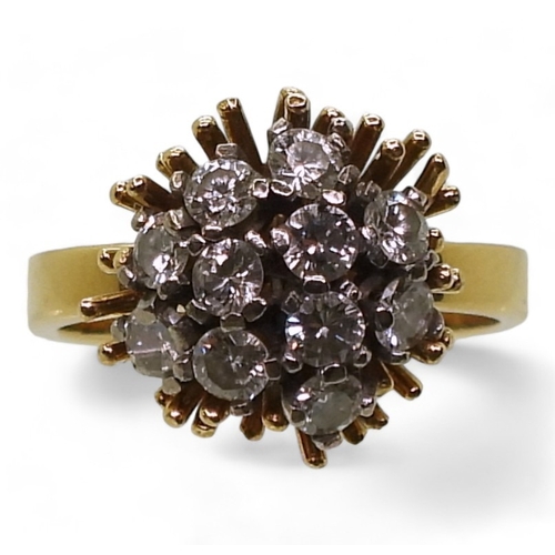 2822 - AN 18CT GOLD RETRO RINGset with a cluster of diamonds, with an estimated approximate combined total ... 