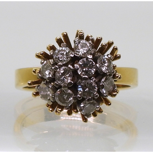 2822 - AN 18CT GOLD RETRO RINGset with a cluster of diamonds, with an estimated approximate combined total ... 