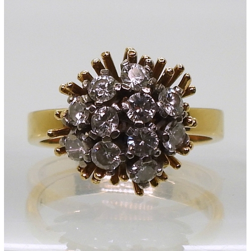 2822 - AN 18CT GOLD RETRO RINGset with a cluster of diamonds, with an estimated approximate combined total ... 