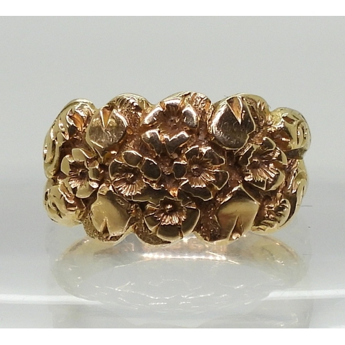 2827 - AN 18CT GOLD MOURNING RINGthe band decorated with flowers, hallmarked Birmingham 1919, with inscript... 